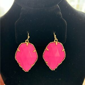 Kendra Scott pink drop earrings in gold trim.
